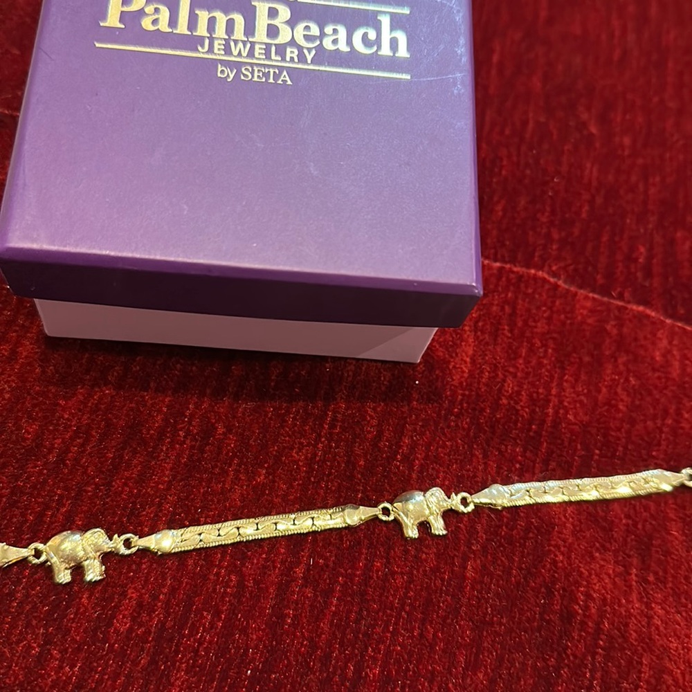 Elephant ankle bracelet.
